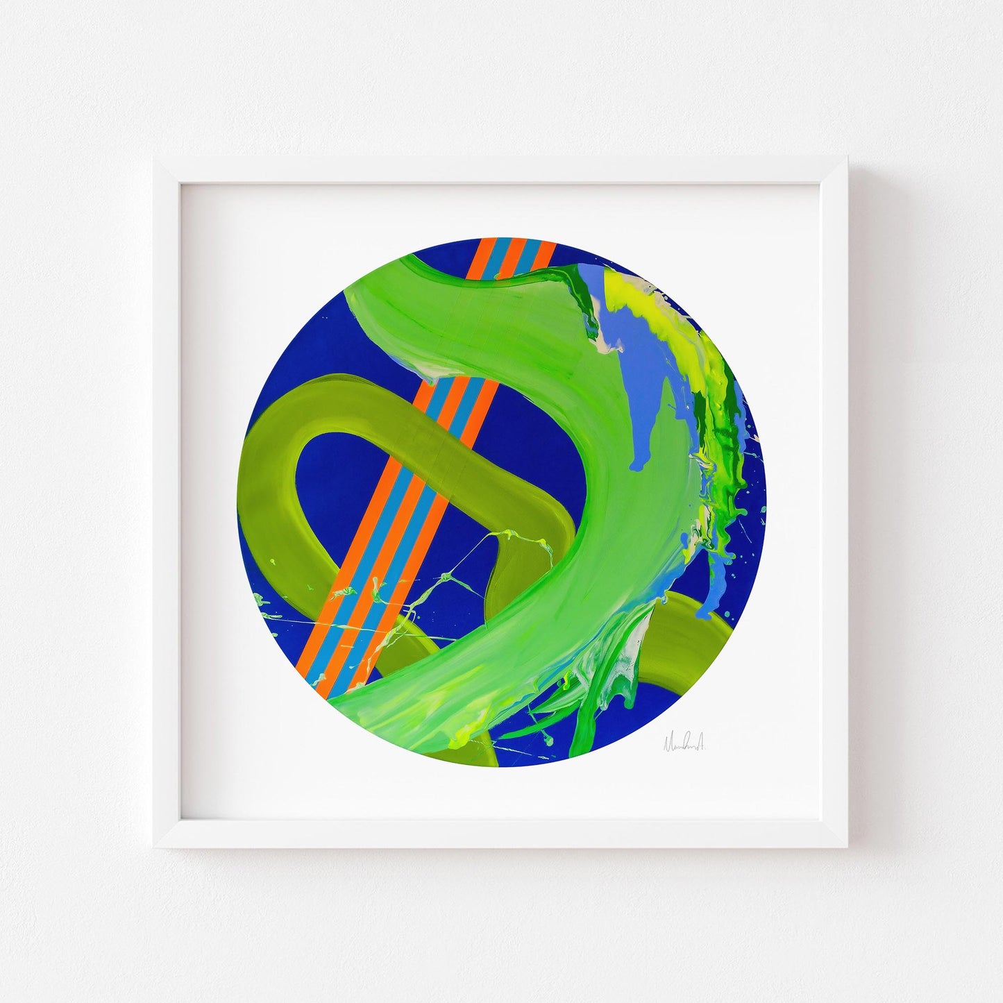 Green and blue circle art print in a white frame.
