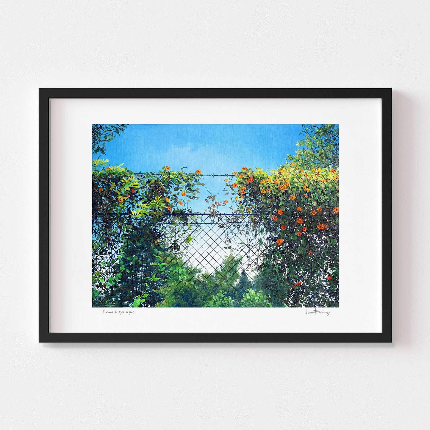 Contemporary wall art of a landscape framed in black wood.
