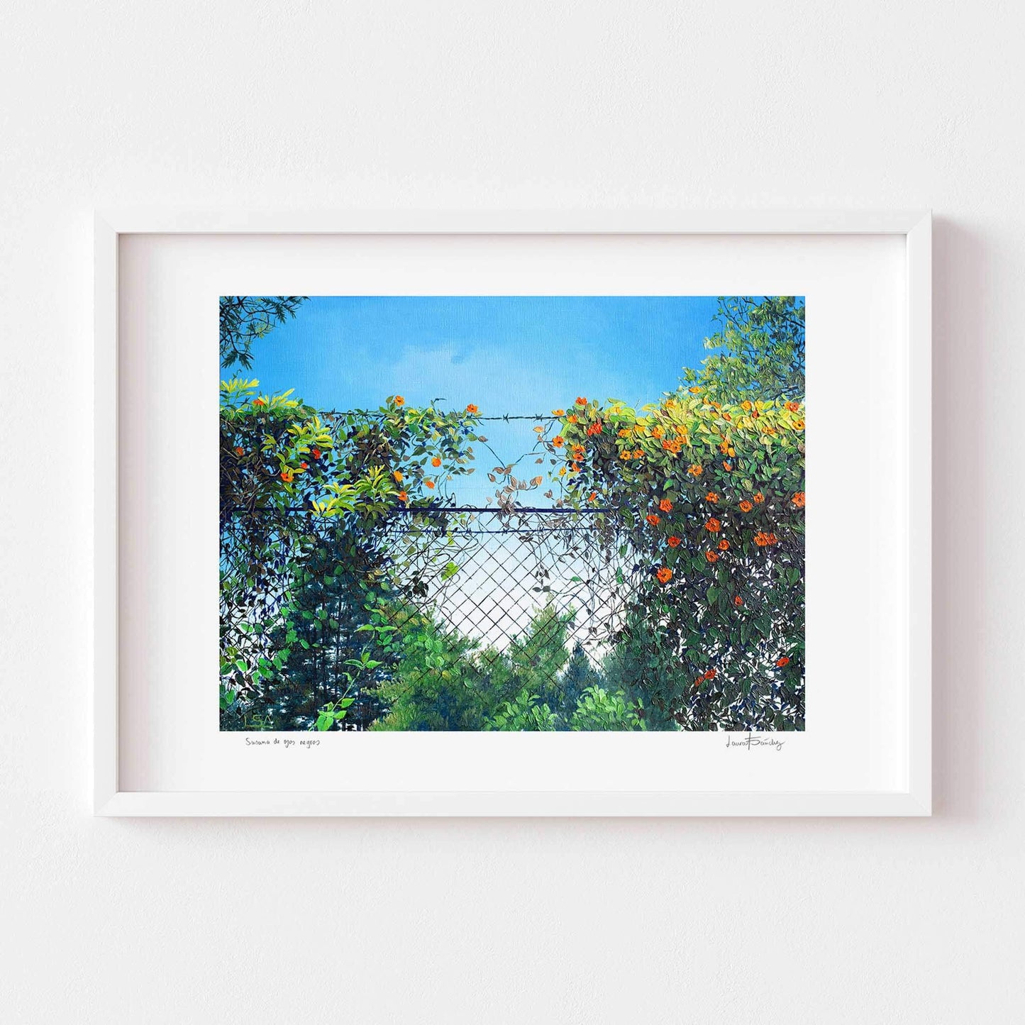 Contemporary wall art of a landscape framed with white wood.