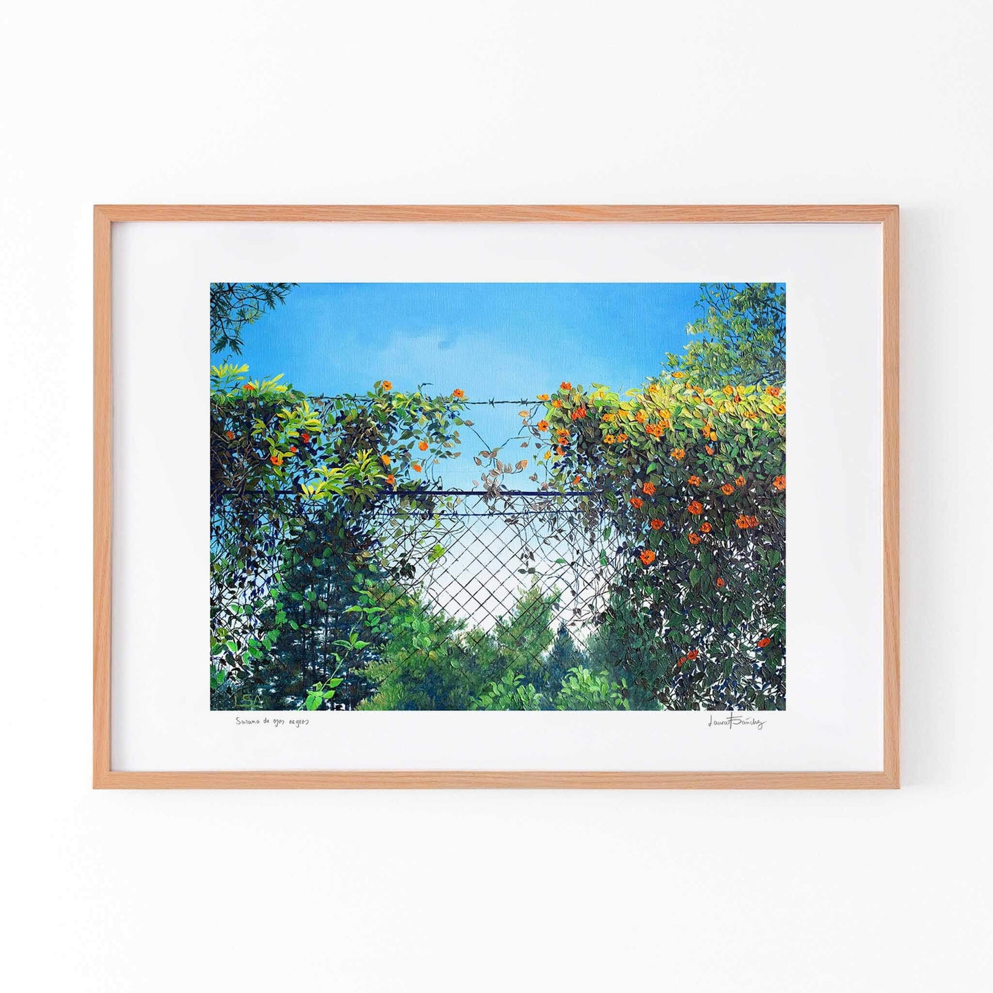 Contemporary wall art of a landscape framed in oak.