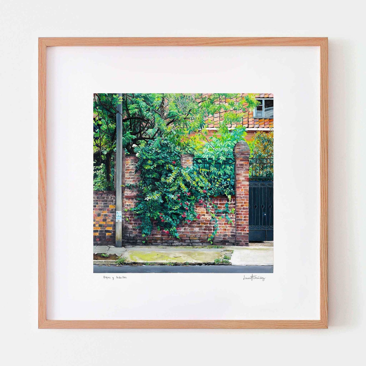 Landscape art print in an oak frame.