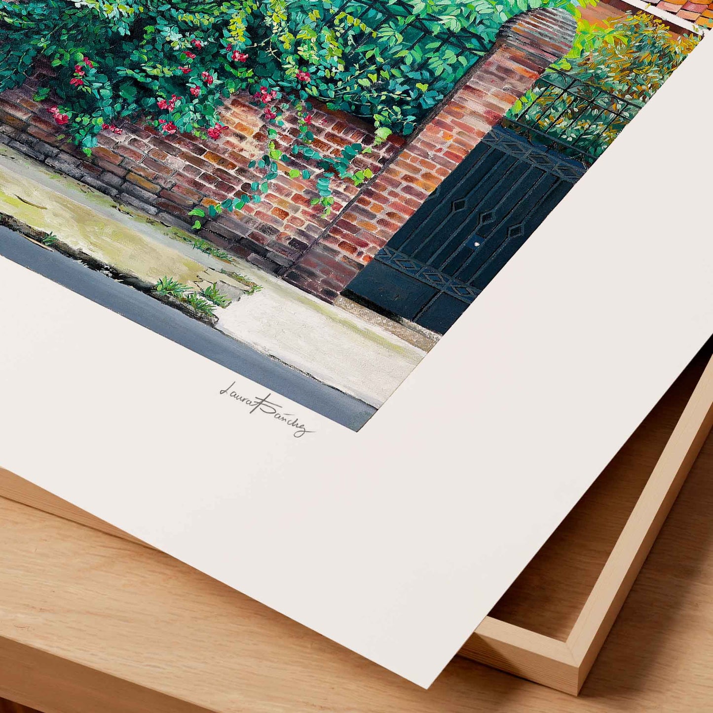 Close-up of an unframed landscape art print.
