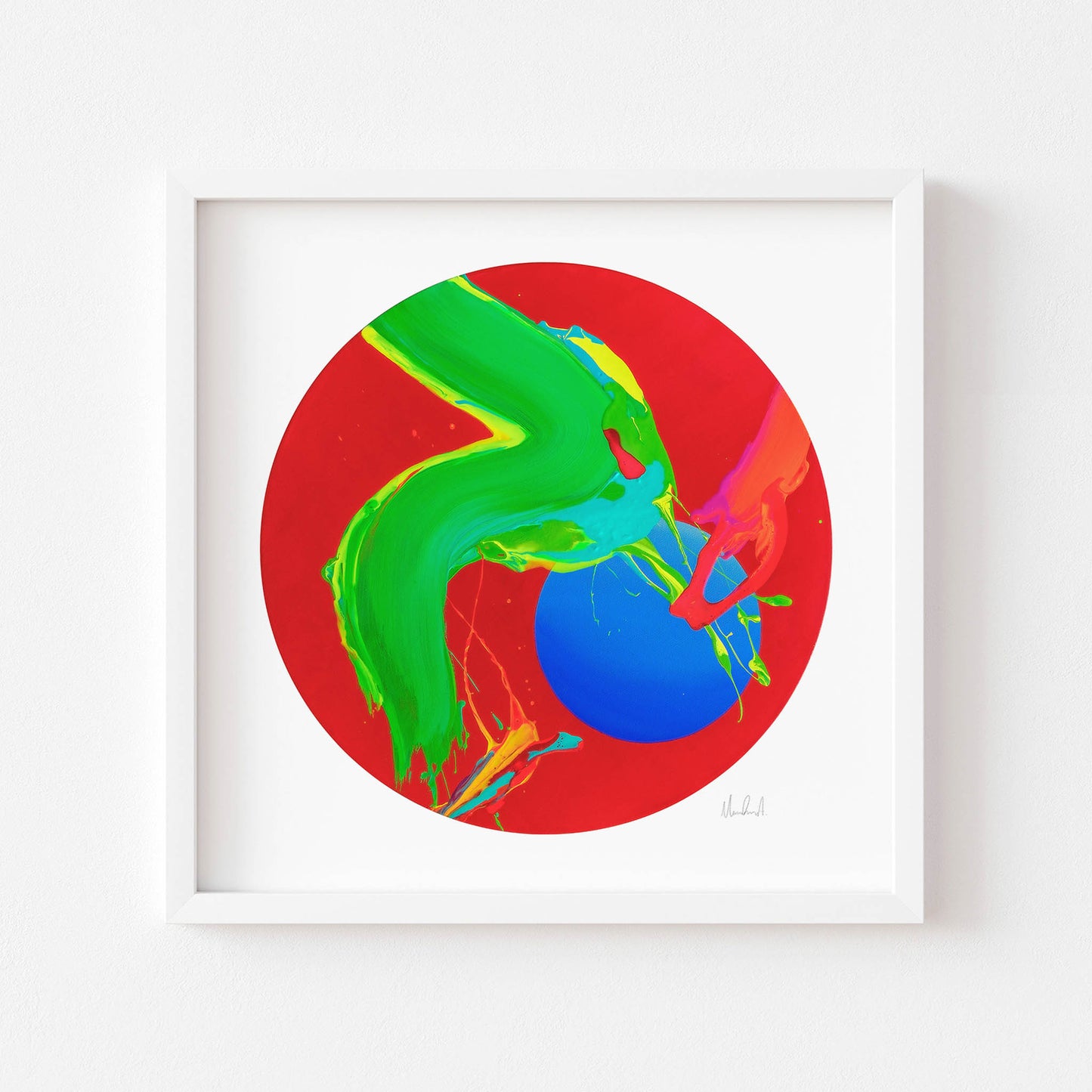 Circular red art print in a white frame.