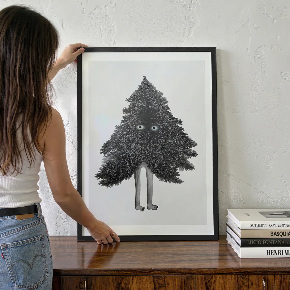 7 Easy Ways to Hang Pictures Without Nails