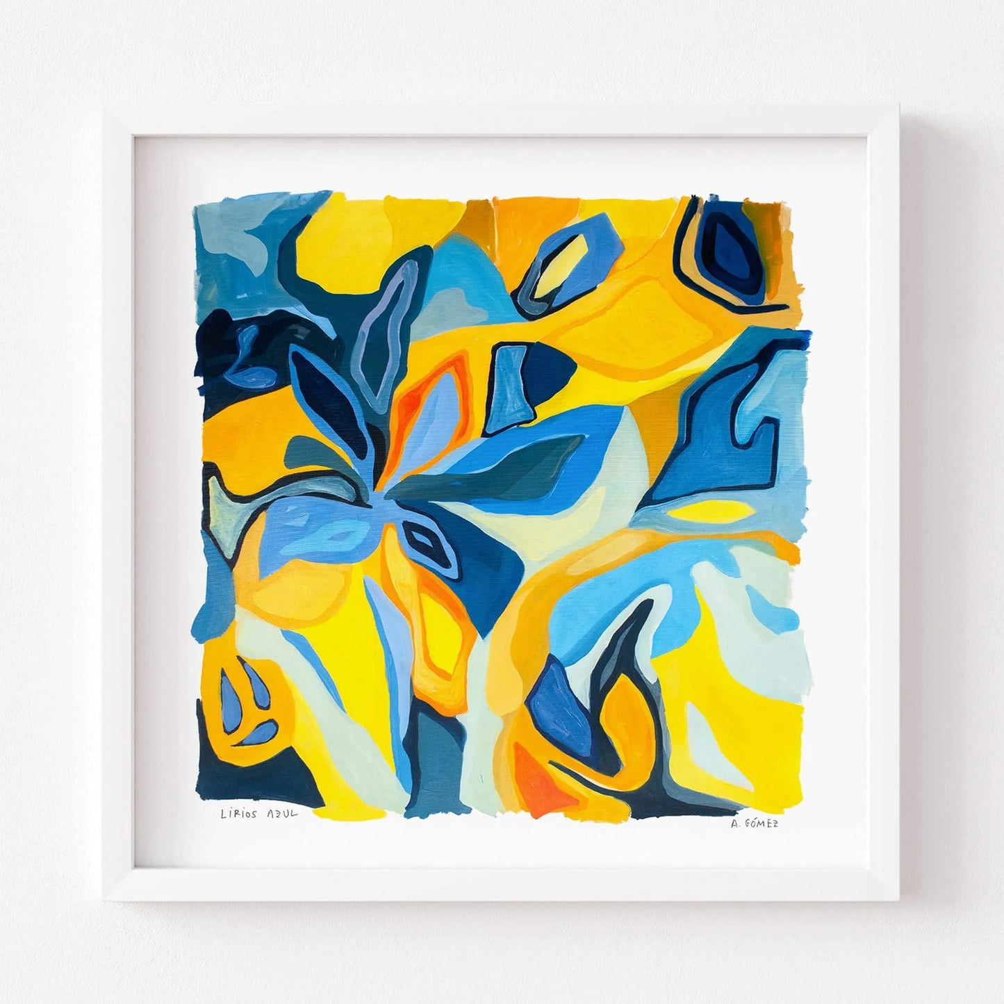 Framed abstract artwork with blue and yellow colors on a white background.
