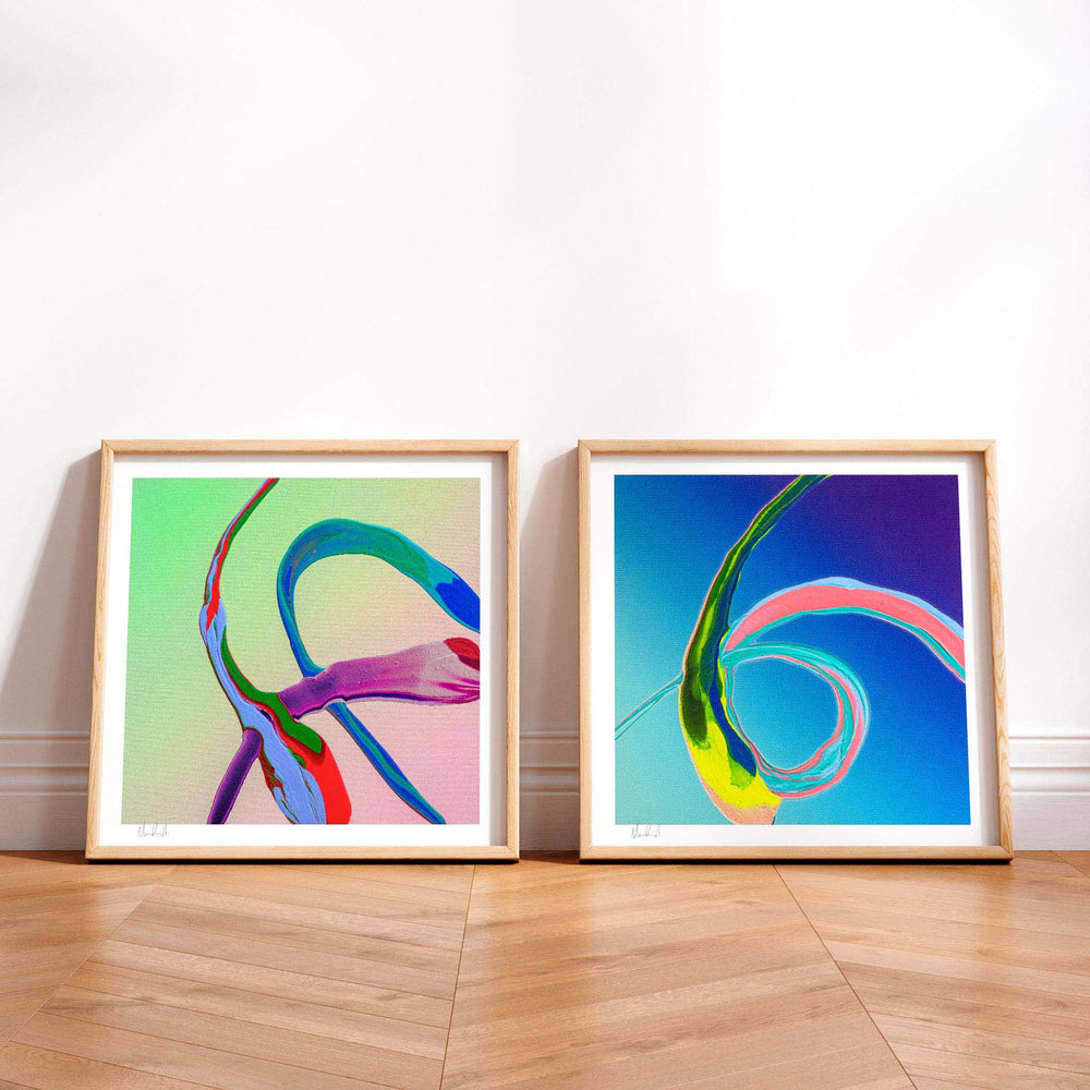 
                  
                    Pair of colourful abstract art prints in a minimalist interior.
                  
                