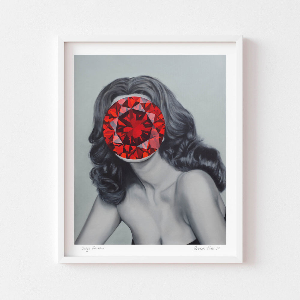 
                  
                    Contemporary wall art print of a woman with a jewel over her face framed in white.
                  
                