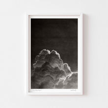  Black and white wall art print of a cloud in a white frame.