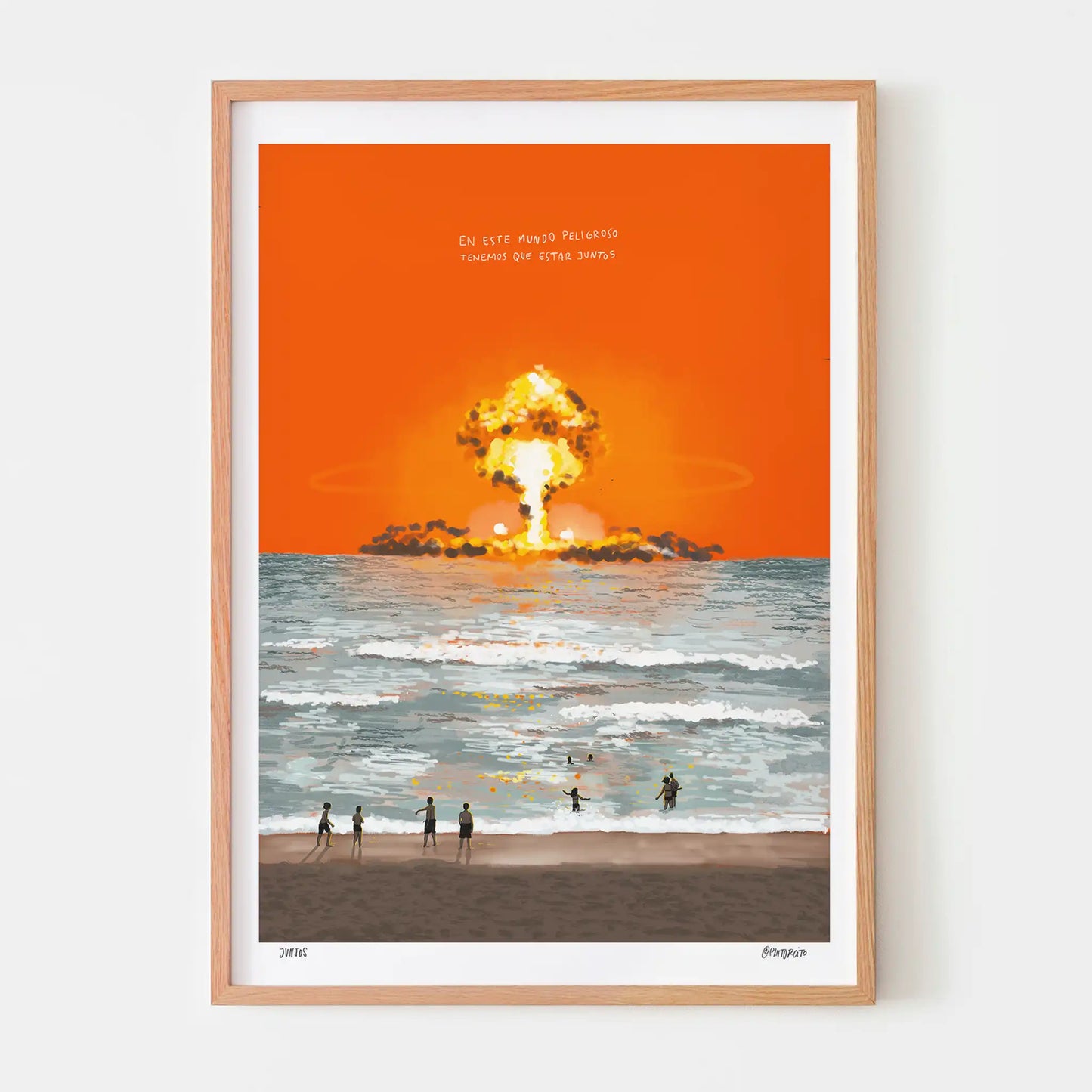 Oak framed art print of a nuclear explosion over water while people on the beach watch on.