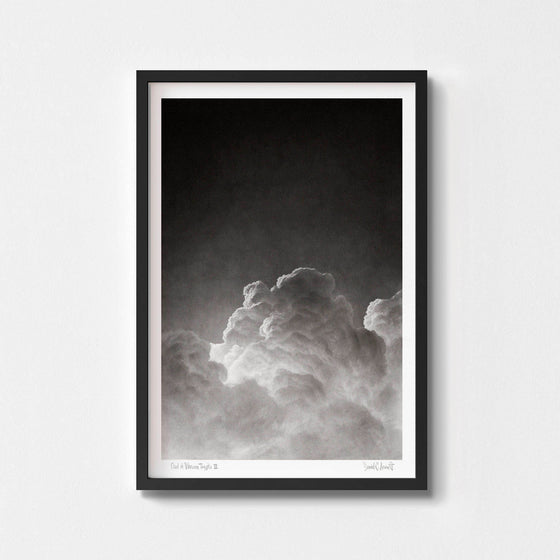 Monochrome art wall print of a cloud framed in black.