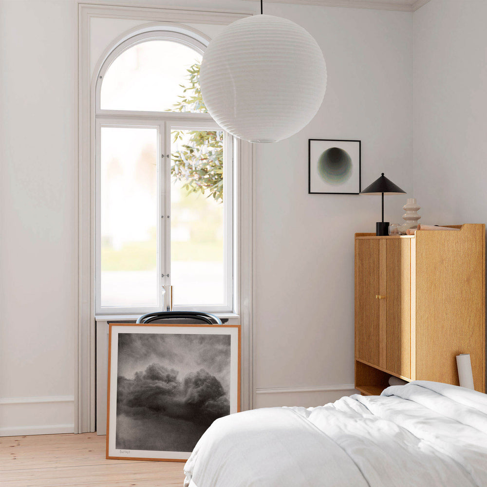 
                  
                    Modern black and white wall decor in a modern bedroom.
                  
                