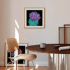 Purple and green thistle wall art print in a living space.