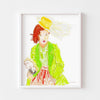 Contemporary wall art print of a girl in green framed in white.