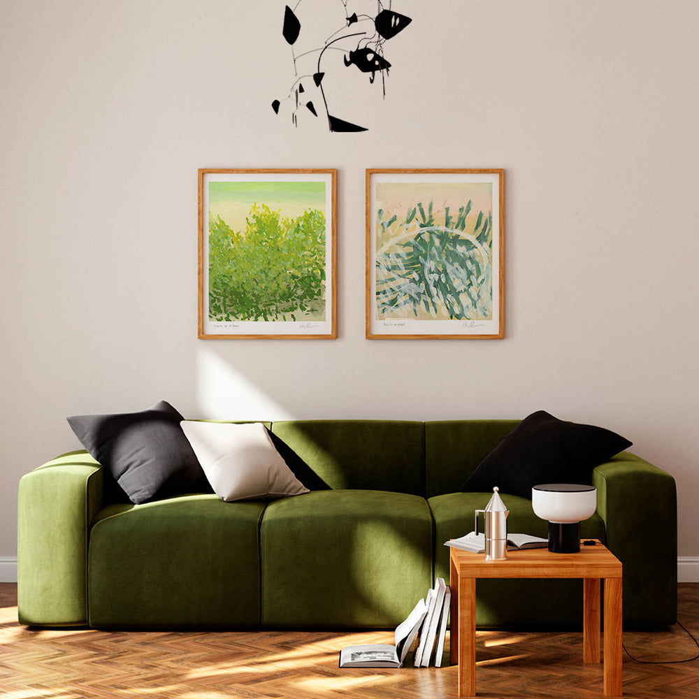 
                  
                    Pair of modern botanical wall art prints in a contemporary living room.
                  
                