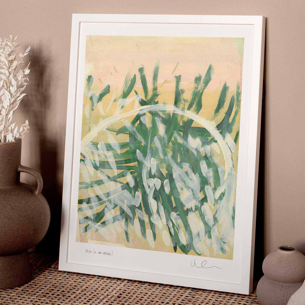 
                  
                    Neutral botanical art wall print framed in white in a neutral living room.
                  
                