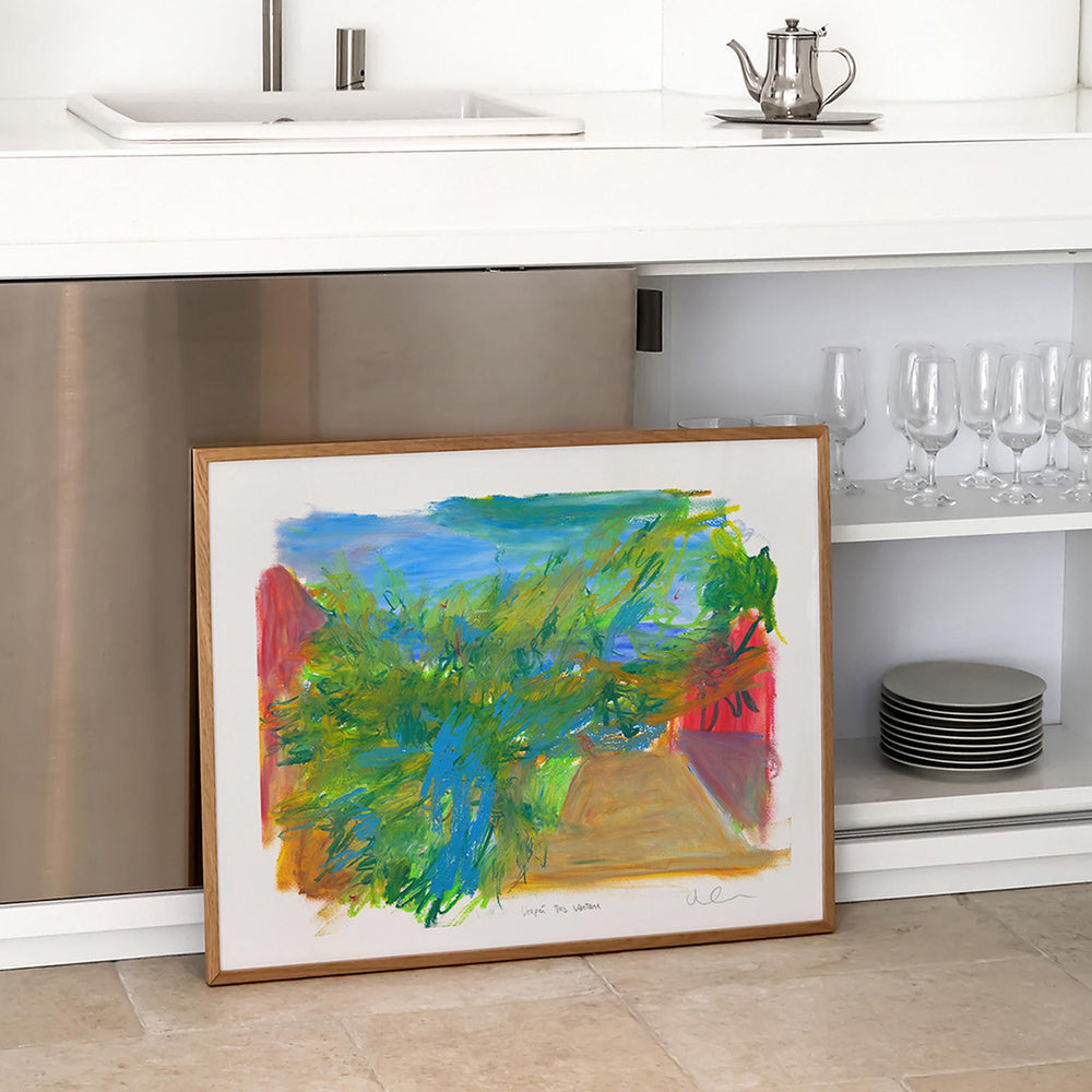 
                  
                    Contemporary landscape wall art prints in a modern kitchen.
                  
                