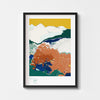 Colourful landscape print in a black frame.