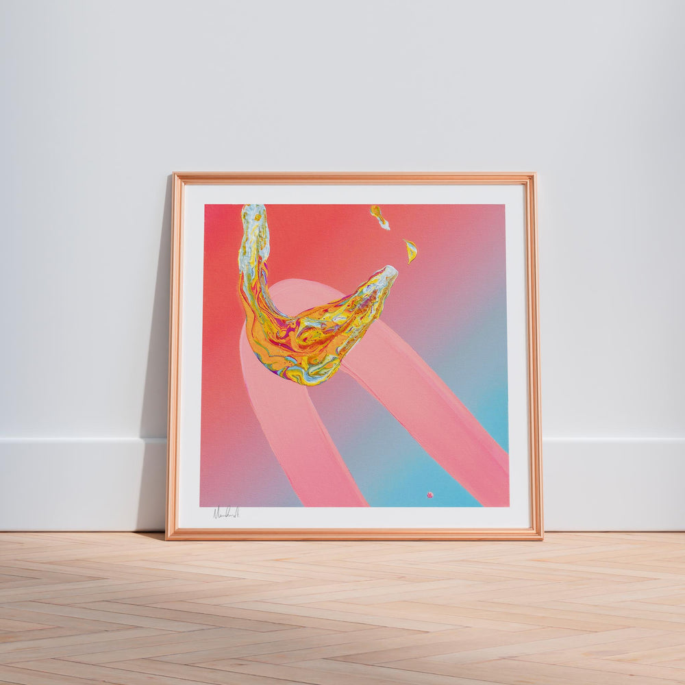 
                  
                    Framed pink and orange contemporary art print in a neutral interior.
                  
                