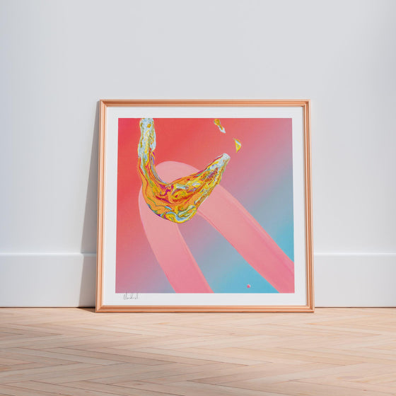 Framed pink and orange contemporary art print in a neutral interior.