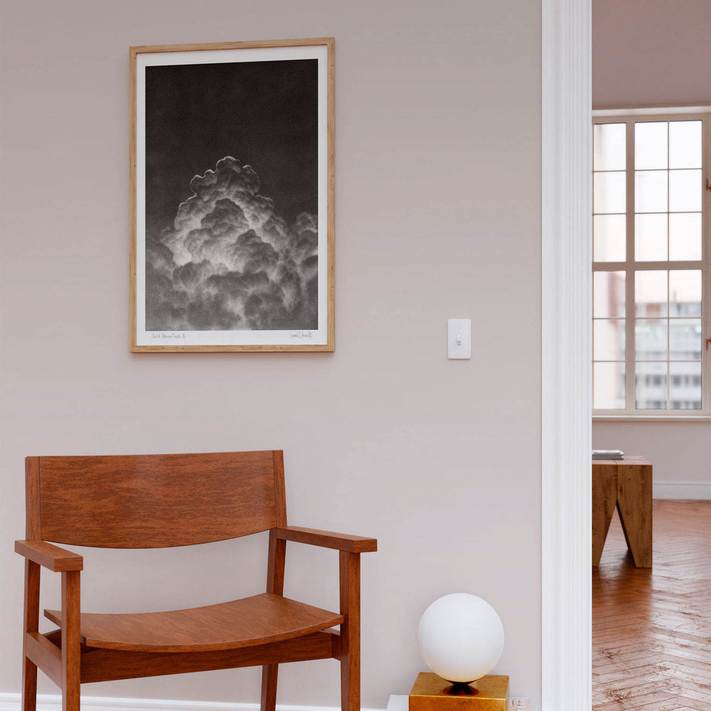 
                  
                    Framed monochrome fine art print of a cloud in a neutral modern interior.
                  
                