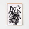 Monochrome wall art poster of a lady with a flamingo headdress in an oak frame.