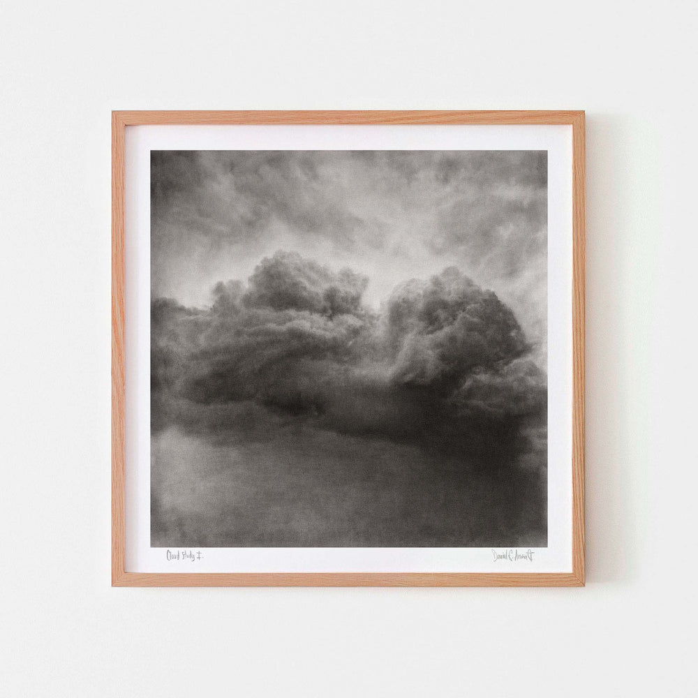 
                  
                    Monochrome art print of a cloud in an oak frame.
                  
                