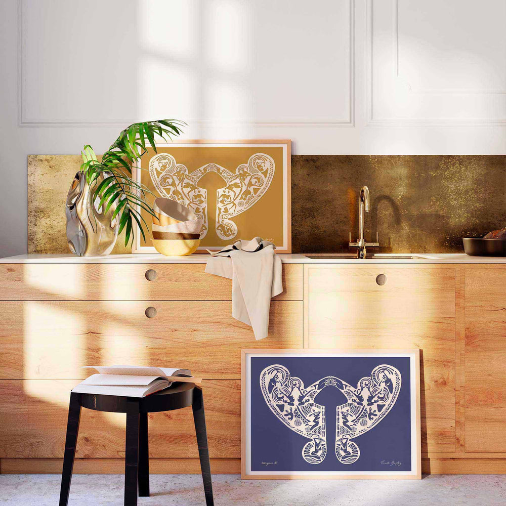 
                  
                    Pair of modern wall art prints with female forms in a contemporary kitchen.
                  
                