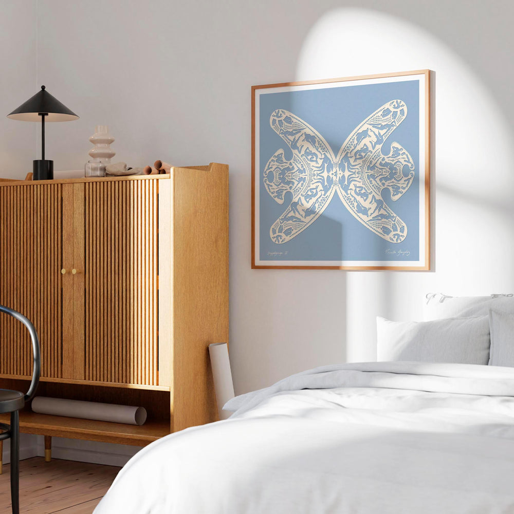 
                  
                    Large white and blue wall art print in a modern bedroom.
                  
                