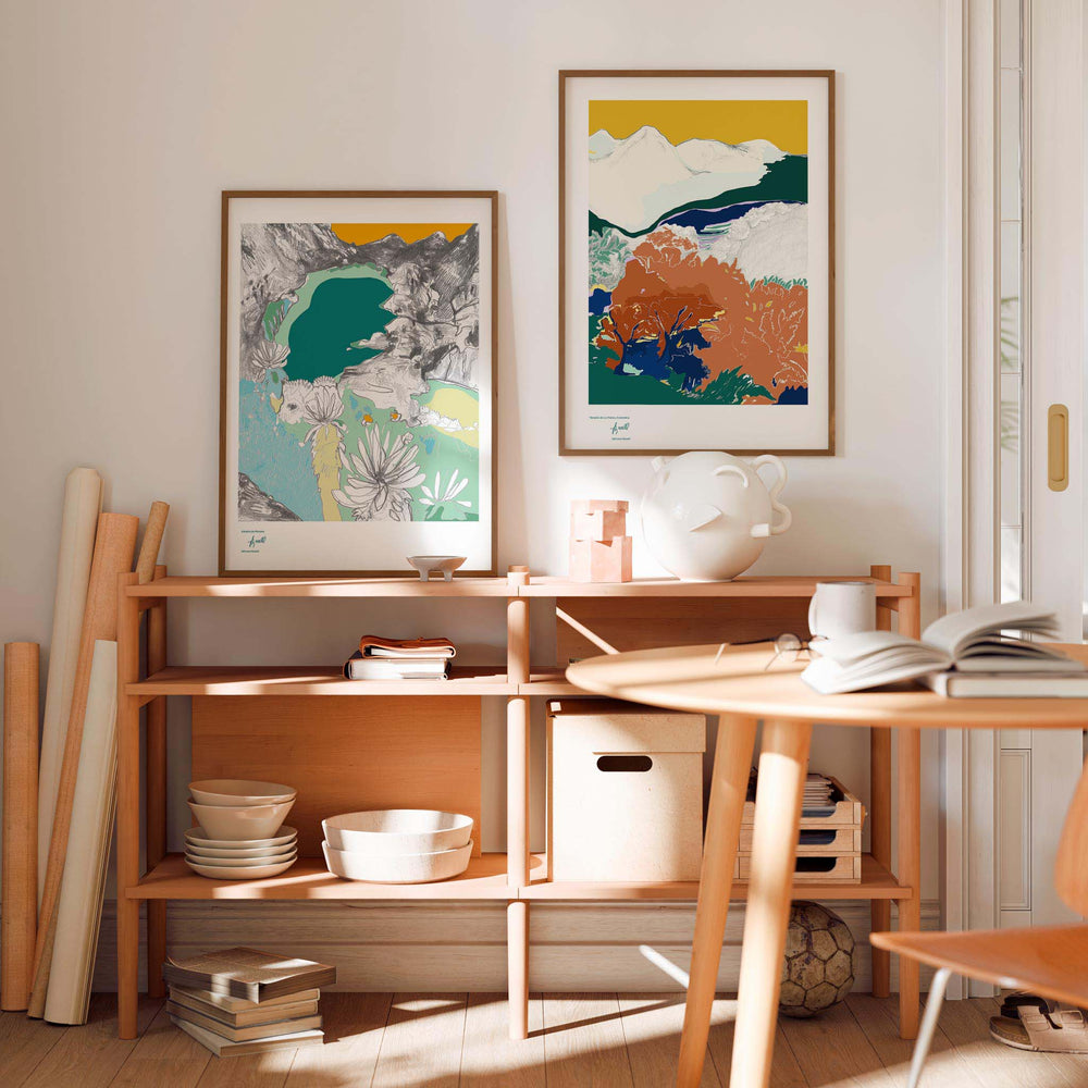 
                  
                    Two framed art prints of colourful landscapes in a modern living space.
                  
                