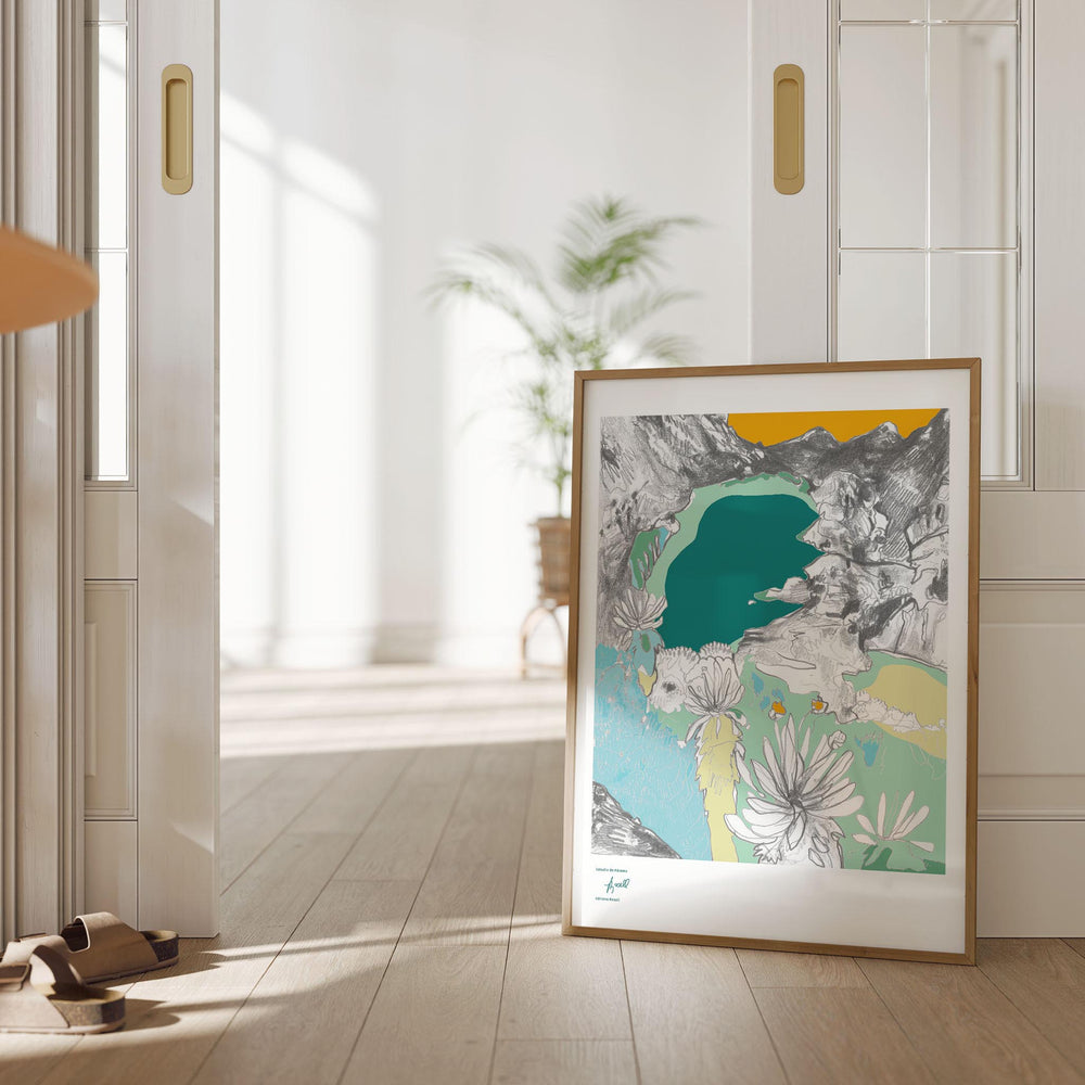 
                  
                    Light green and blue framed landscape print in a minimalist interior.
                  
                