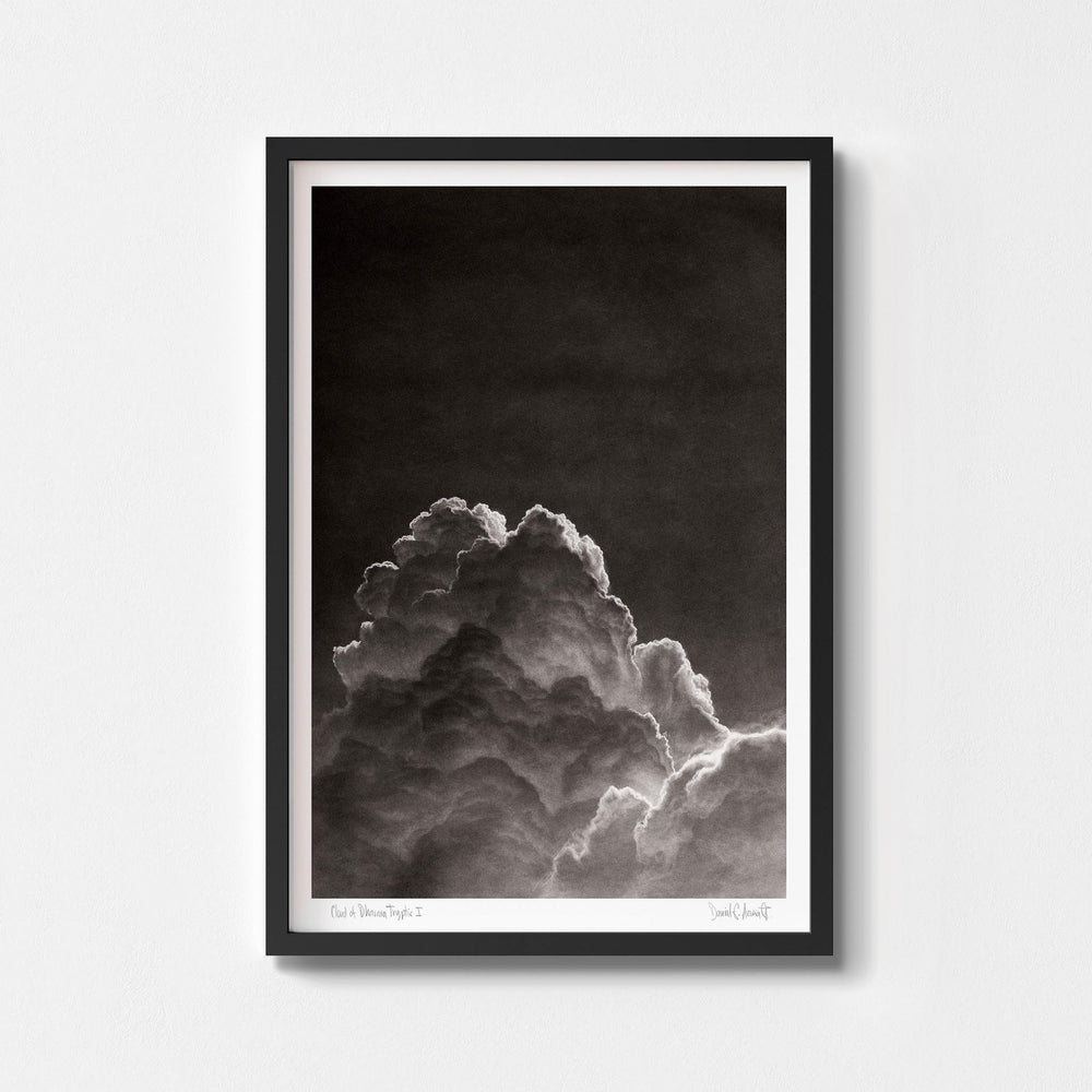 
                  
                    Black and white wall art print of a cloud in a black frame.
                  
                