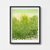 Bold green landscape wall art print framed in black.