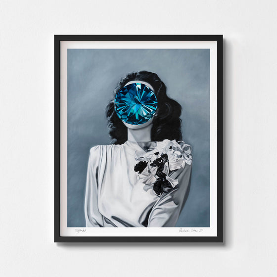 Contemporary portrait of a woman with a blue jewel covering her face framed in black.