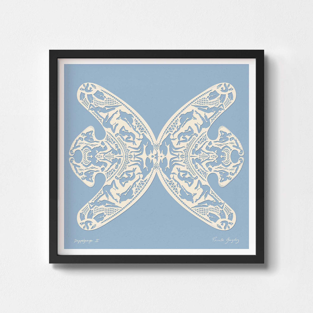 
                  
                    Square blue and white paper cut art print framed in black.
                  
                