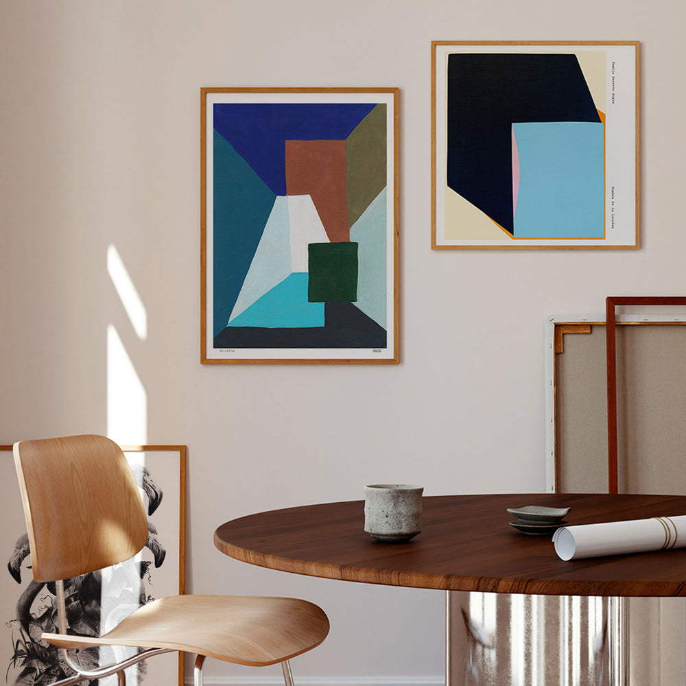 
                  
                    Pair of modern geometric wall art posters in a contemporary home interior.
                  
                