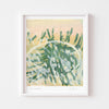 Neutral landscape wall art print framed in white.