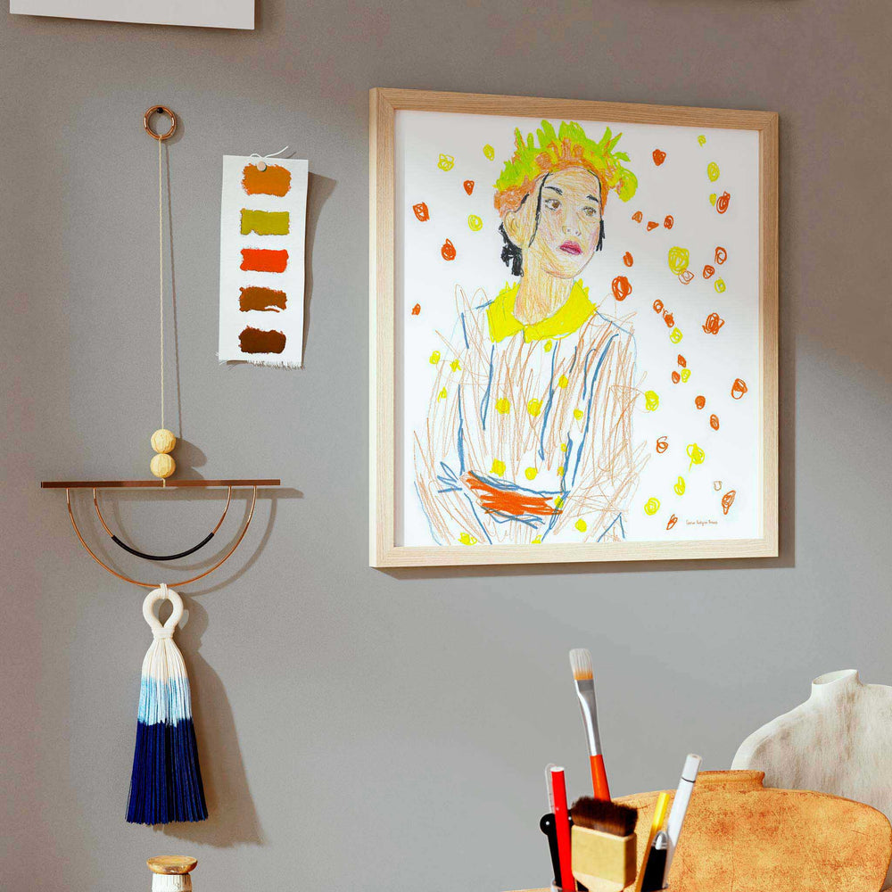 
                  
                    Modern art print portrait of a girl framed in oak in a modern home studio.
                  
                